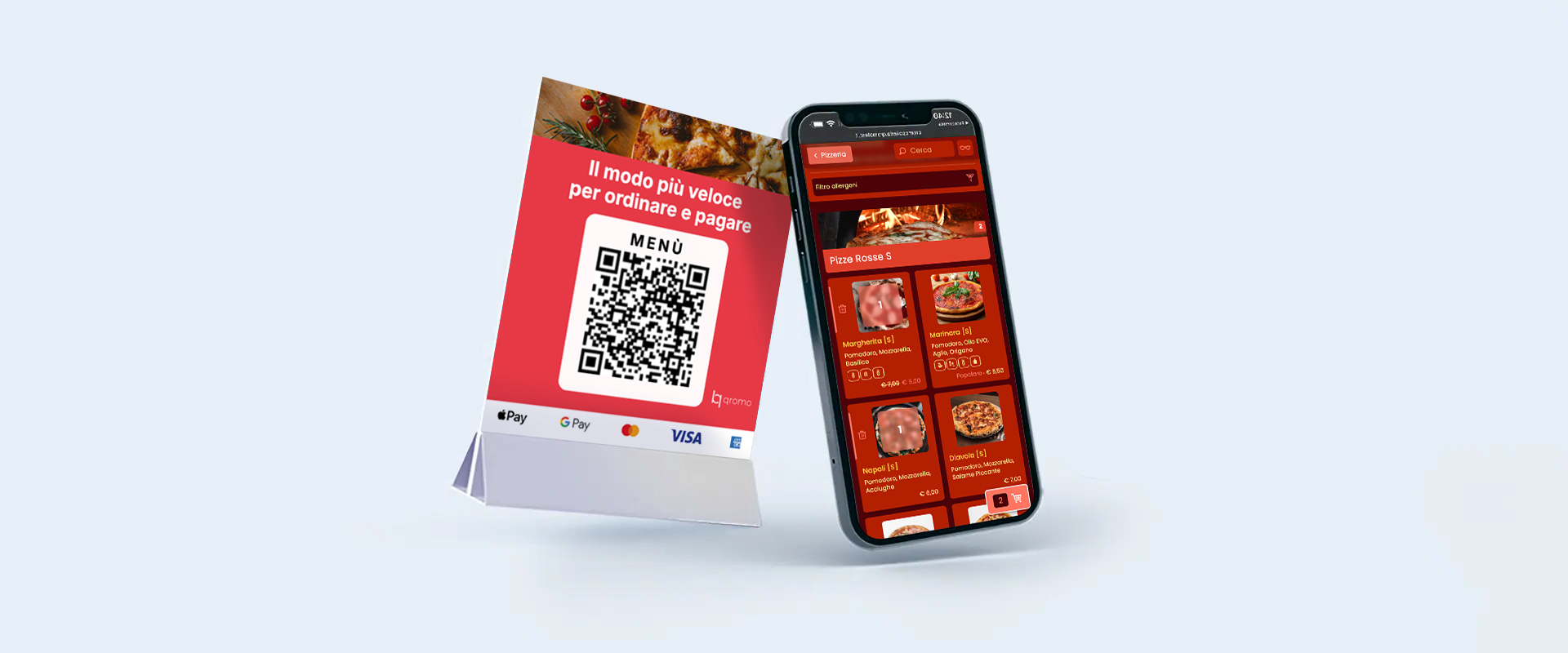 Atril de mesa con código QR para pedidos junto a un smartphone con la carta digital de Qromo